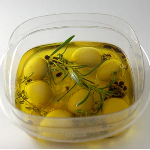 Spherical Olives macerated in aromatized oil