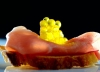 Spherification Caviaroli Olive Oil Caviar on Prosciutto