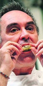 Ferran eating caviaroli cracker